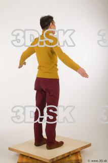 Whole body yellow sweater red trousers brown shoes of Sidney…